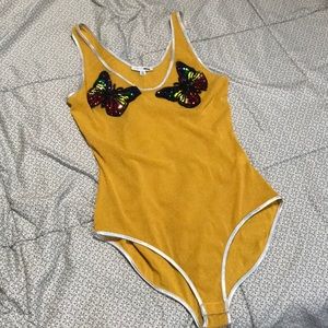 Mustard colored with glitter, size X-large